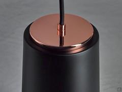 Detail of the fabric cable attachment to the black and copper diffuser