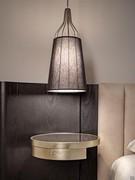 Cantori's elongated pendant lamp Sofia, perfect for spot lighting on bedside tables in the master bedroom