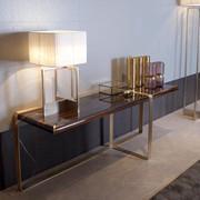 Diogene table lamp in steel and fabric, supporting a console in entrance hall