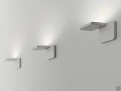 Lamp Quad in the sconce version, ideal for illuminating ceilings and large walls