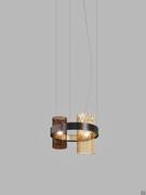 4-light pendant Armonia in burnt earth and amber glass with black nickel and satin gold frame