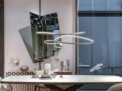 Circular metal lamp Magellano by Cattelan - curvy, modern lines