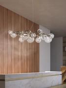 15-point pendant lamp with clear crystal spheres and satin gold metal frame