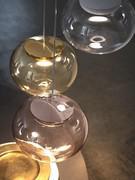 Close-up of the La Mariée lamps in clear, copper and gold glass