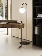 Hope chandelier in the floor version paired with the Wellswood desk and Maddie bookcase from the same collection