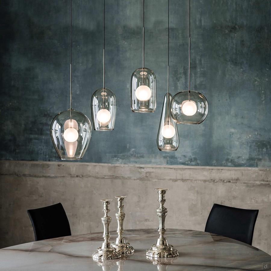 Melody is a ceiling pendant single smoked glass lamp by Cattelan. It is available in 5 shapes that are perfect to create custom compositions and that recall the shape of elegant wine glasses