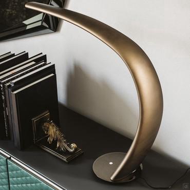 Mamba bent table lamp by Cattelan