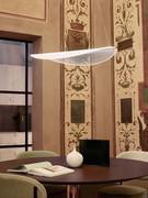 Diphy leaf-shaped lamp in the suspended version, ideal for illuminating a round table as in the situation in the photo