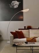 Diphy lamp in the arched floor lamp version, with its characteristic organic shapes reminiscent of a branch and a leaf