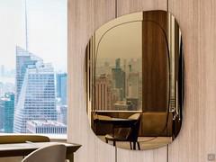 Wall mirror with irregular Gallant profile in mirrored bronze glass version