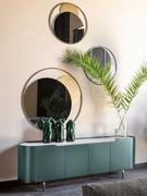 Circe round frame mirror in multi-element arrangement