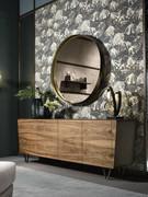 Round mirror Rodin by Cantori, easily paired with a sideboard or dresser to give dynamism and elegance to the whole room