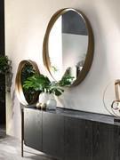 Round mirror with steel frame Rodin by Cantori offered in combination with a sideboard