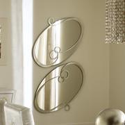 J'Adore oval mirror with metal swirls by Cantori