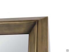 Details of the Wide frame, one of three available on the mirror Tema. Here offered in a bronzed metal finish