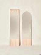 Domu mirror standing against the wall in the two available measurements and in natural ash finish