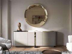 Cosmos round mirror by Cattelan in combination with Dynasty sideboard with bronzed glass top