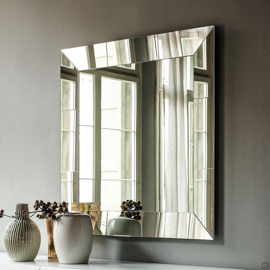 Regal glass framed mirror by Cattelan, square model.