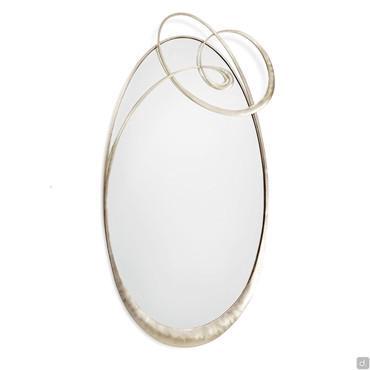 Ghirigori mirror with swirl metal frame with an elegant and refined look