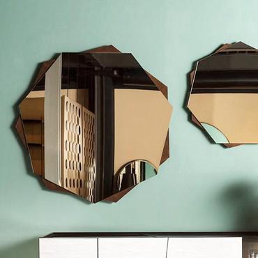 Medea shaped mirror with metal frame by Cantori