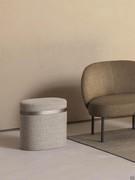 Storage pouf with tray Coffer beside the armless armchair Rakel