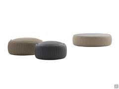 Leatherette-covered pouf model Plissé, which can be combined with the sofa-front coffee table of the same name