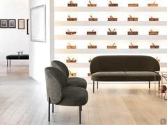 Example of using the Rakel bench in a collective space and in combination with matching armchairs and sofa