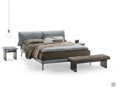 Ametista bench with upholstered cushion, placed at the bottom of the bed