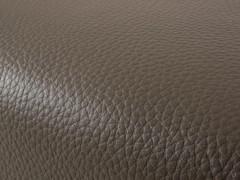 Detail of the leather pouf upholstery