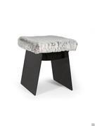 The Calvin pouffe stool with an open metal structure and seat cushion upholstered in synthetic fur (extra, not in the sample book)