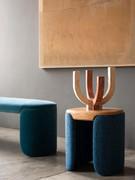 Detail of the Flower pouf with wooden top that makes it ideal both as a stool and as a coffee table