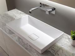 Detail of the built-in washbasin above countertop mod. Paola in mineralguss (the mixer is not included in the offer)