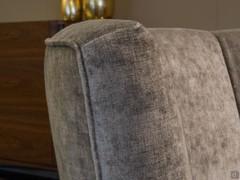 Detail of the high back of the Petra outlet armchairs