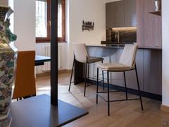 Stools for kitchen countertop and peninsula, leather, with four metal legs painted Black