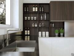 Detail of the sink integrated in the worktop and the composition of open and closed wall units