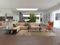 Open-plan living room separated from the entrance area by a winter garden