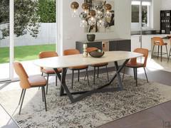 Dining room with Emperador marble and heat-treated oak table, leather chairs, glass chandelier 