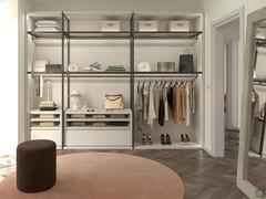 Open walk-in wardrobe with illuminated shelves, drawers and knitting compartments