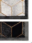 Detail of the carpet border on the silver-gray side and the black side