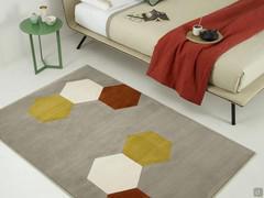 Acapulco rug, colour 26 taupe grey with hexagons 33 brick orange, 15 cream and 40 yellow