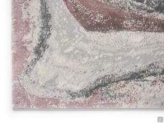 Detail of the marble-effect carpet in shades of grey, sage and antique pink