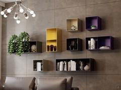 Cube shelves Swan made of painted metal are freely placeable on the wall, with the rectangular models fixable both horizontally and vertically