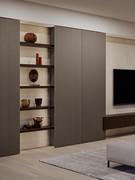 Shelves applied on wall panels here pictured in grey oak wood