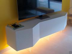 Pyramide design sideboard used as a TV unit; this version stands on glass feet (photo sent by a client)