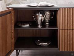 The two hinged doors at either end of the Savannah sideboard feature a standard interior shelf to match the base and handles