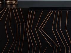 Detail of the inserts, which, with their variable inclination, give the sideboard the special effect of movement