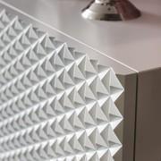 Detail of the polyurethane diamond-shaped doors of the sideboard Royalton by Cattelan