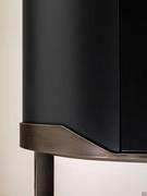 Detail of the profile of the base curved to accommodate the storage cabinet