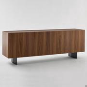 Outline sideboard with high feet in a romboidal shape in painted metal or in a burnished metal