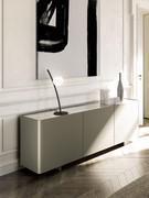 Three-quarter view of Maia modern sideboard with metal feet, Glossy Onix ceramic and Titanium lacquered doors